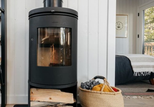 Can a wood stove heat a two story house?